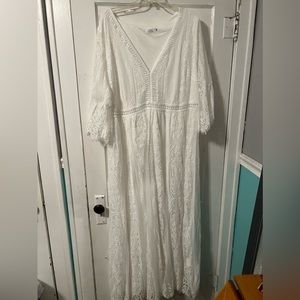 Long white flowey sleeve dress. New never worn. Smoke free home.